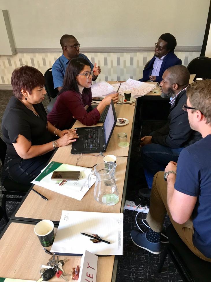 Engineers collaborating across backgrounds—a visual metaphor for power skills enabling diverse teamwork.